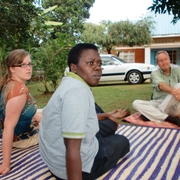 Rose sitting in her yard with Hannah O'Brien and Mike Wargo.